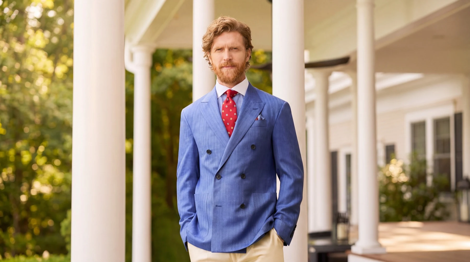 Custom Coppley double-breasted suit at Kinkade's Fine Clothing — Madison-area Southern porch portrait