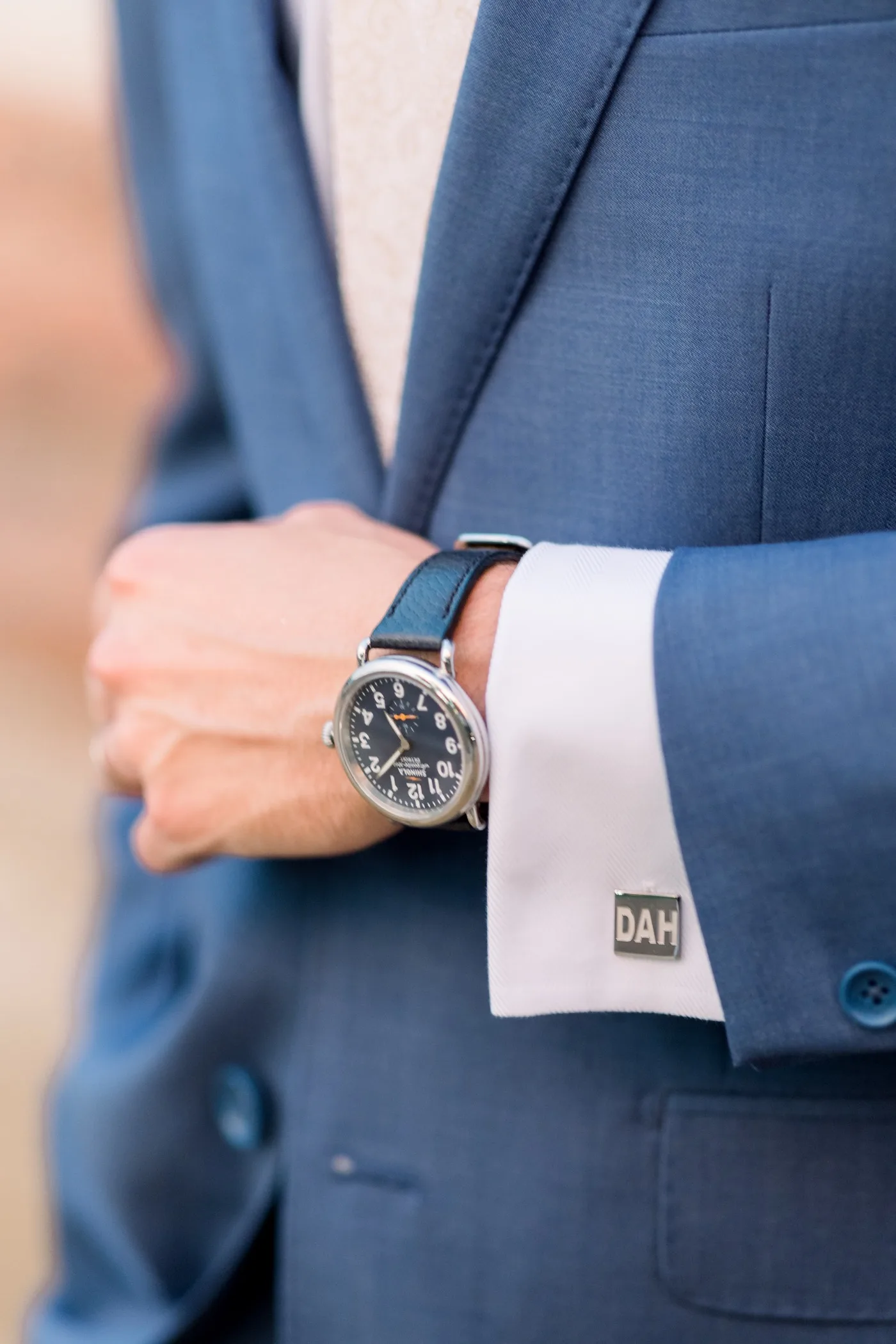 Monogrammed cufflink on custom shirt — personal touches for the corporate wardrobe